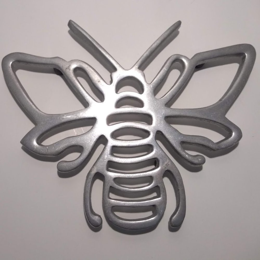 Bee shaped Metal trivet with rubber feet